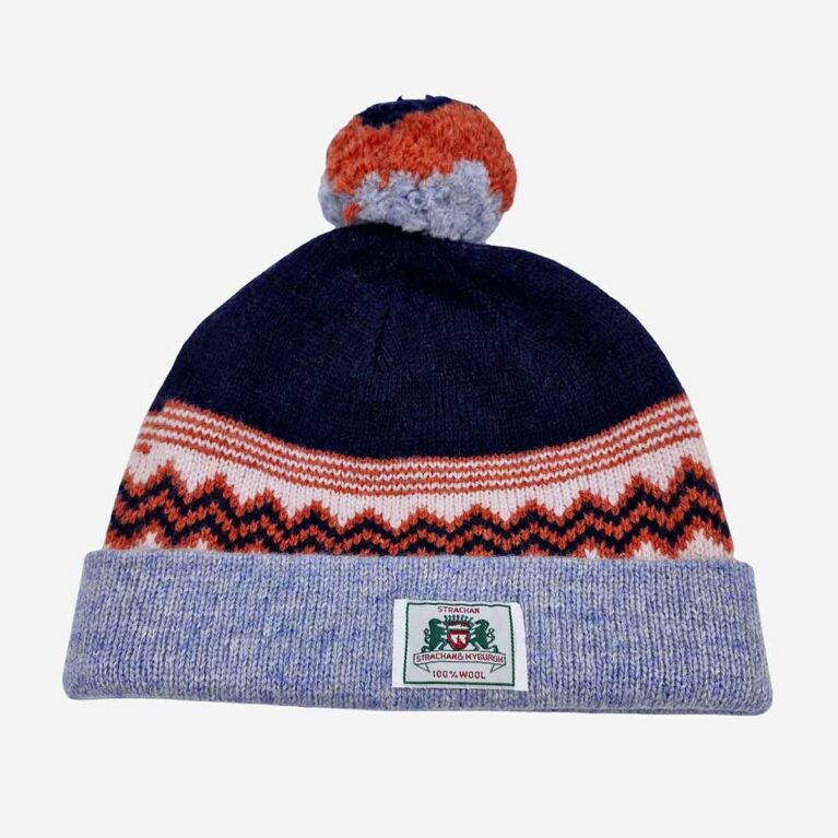 Top view of Strachan & Myburgh zigzag wool beanie in navy blue white and light blue with front logo tab