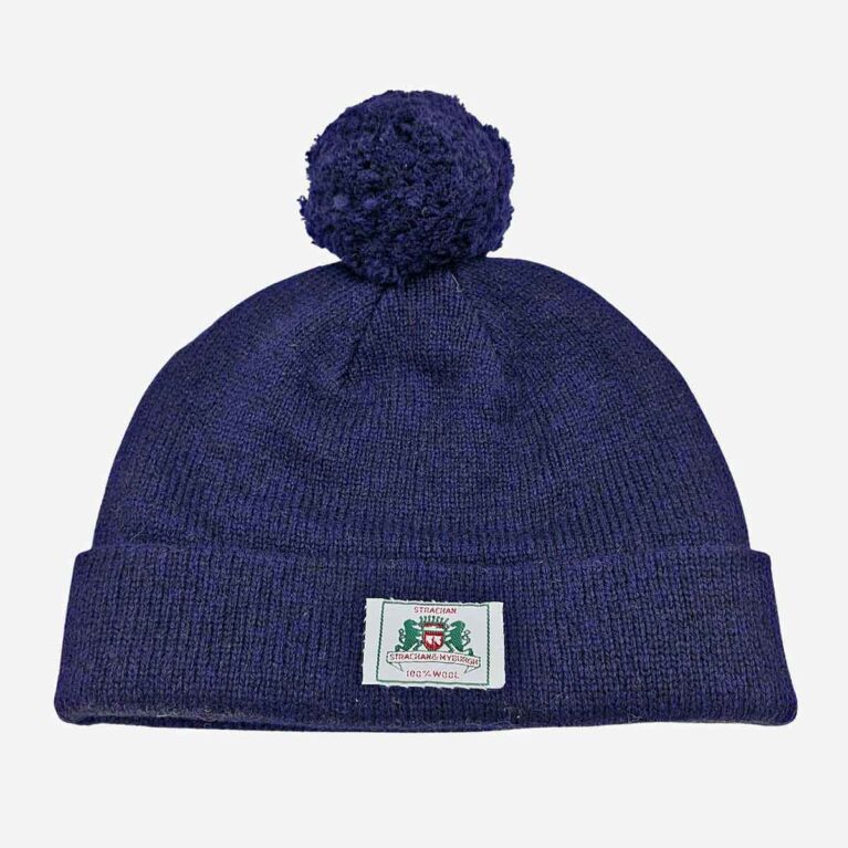 Top view of Strachan plain navy blue wool beanie with stitched Strachan logo tab on front