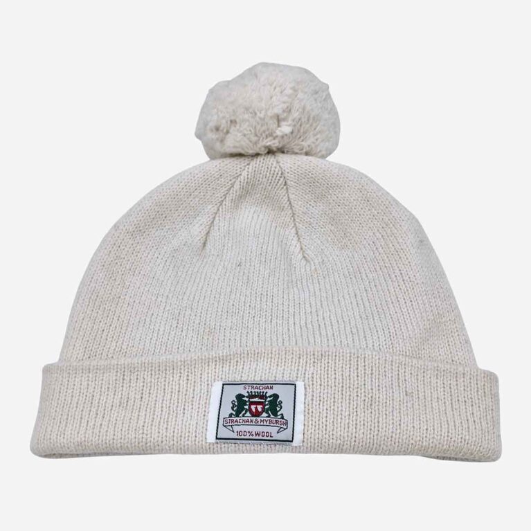 Top view of Strachan plain white wool beanie with stitched Strachan logo tab on front edge