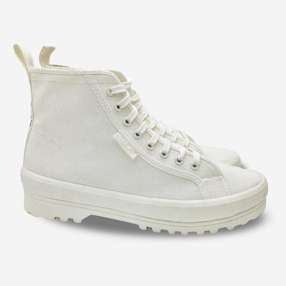 Pair of Superga 2341 Alpina white boots, angled view showing front and side of both high-top boots