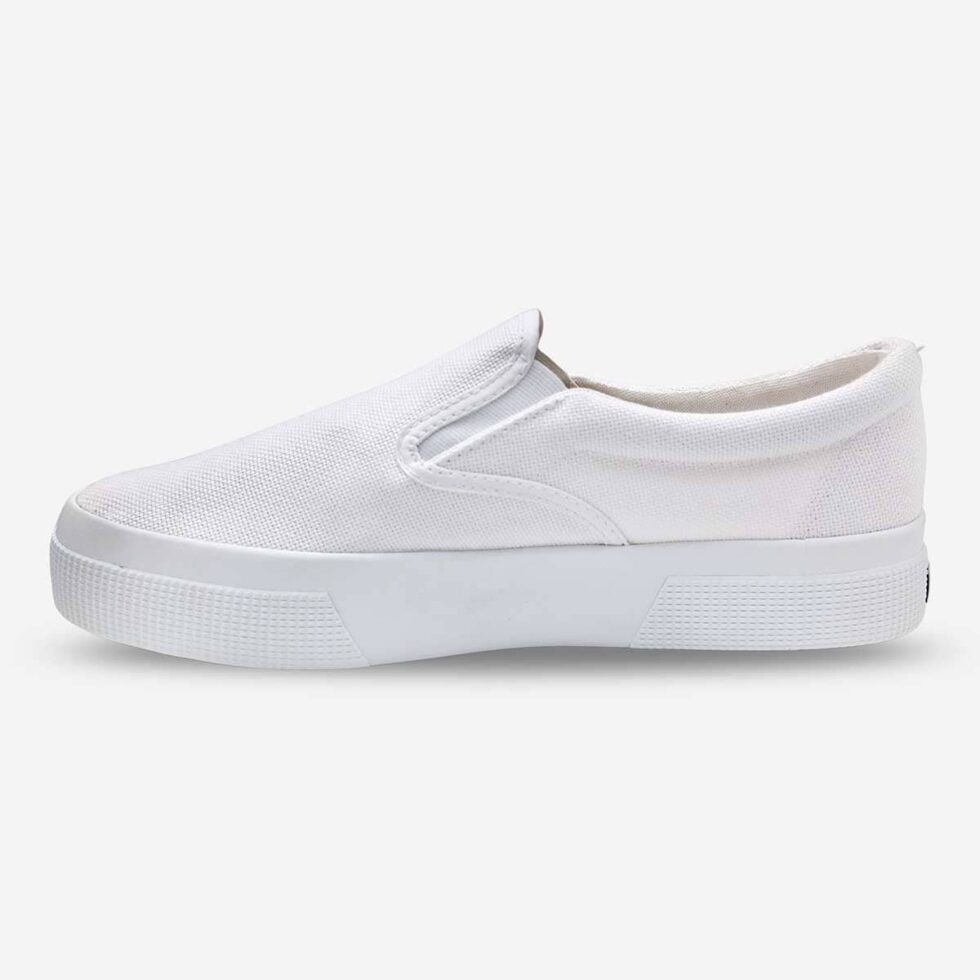 Superga 2740 slip-on sneaker in white, inner side showing elastic panels and canvas upper