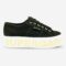 Superga 2790 platform sneaker in black, side-front view with side tab and gold outsole lettering