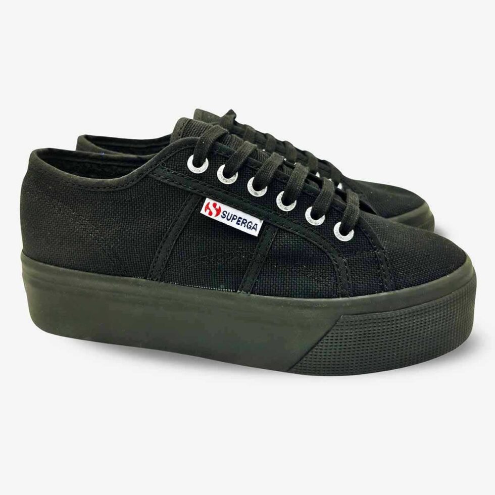 Pair of Superga 2790 full black platform sneakers, angled view showing front and side of both shoes