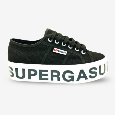 Superga 2790 platform sneaker in black, side-front view showing side tab and white sole with black lettering